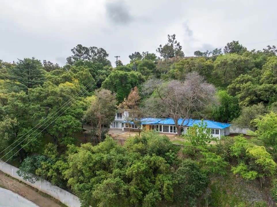Wide hillside motion footage looking across Los Angeles.